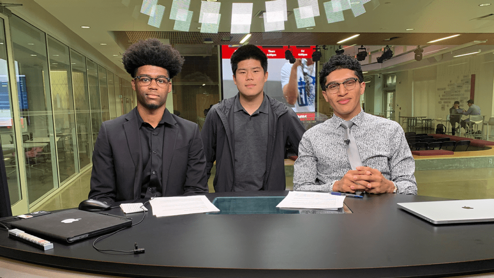 Reagan Griffin Jr. (left) with his podcast co-hosts Eddie Sun (middle) and Julio Martinez (right). Together they host a podcast called, "Hoop and Holler." (Courtesy Reagan Griffin Jr.)