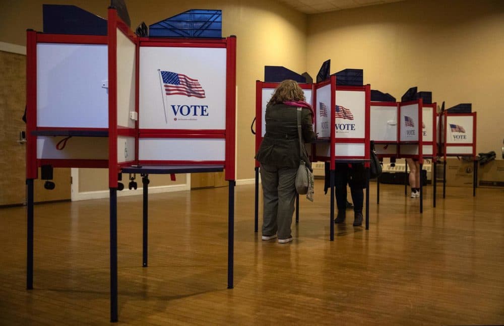 Voters cast their ballots at the Watertown polling station on Bigelow Ave. in March. (Robin Lubbock/WBUR)