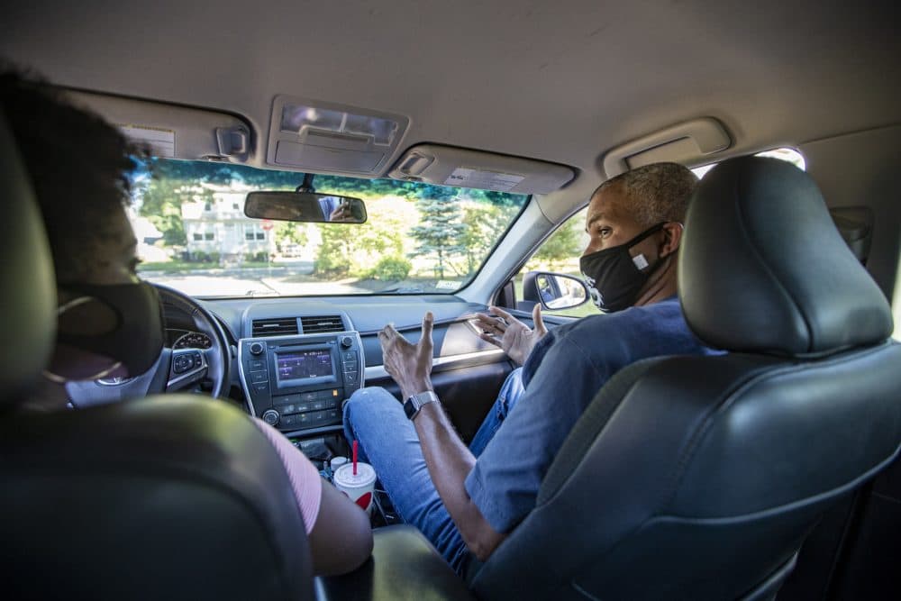 Montiero, going through the fundamentals of parallel parking with Tah. (Jesse Costa/WBUR)