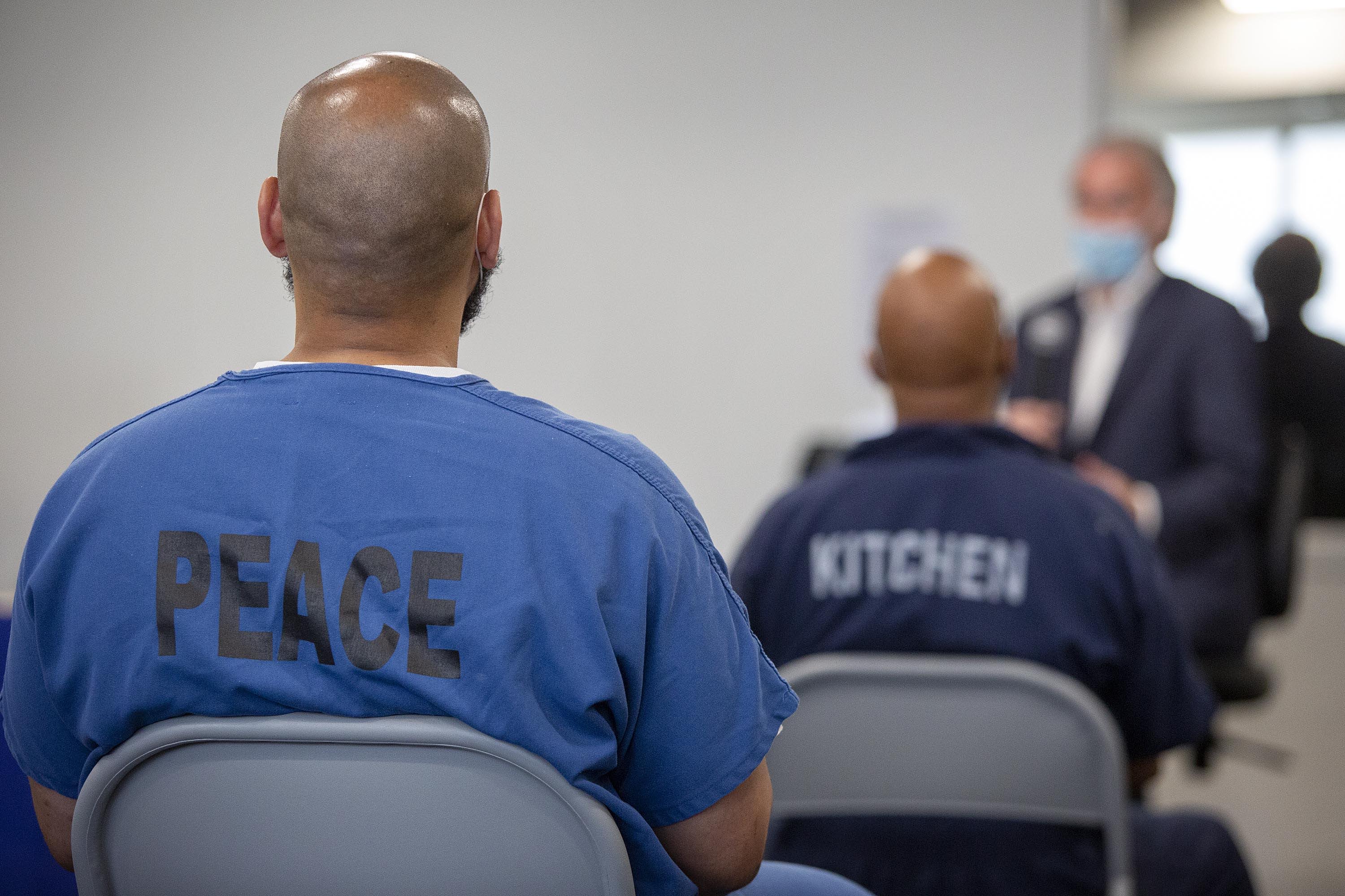 Sen. Ed Markey talks with a group of inmates and detainees at the Suffolk County House of Correction. (Robin Lubbock/WBUR)