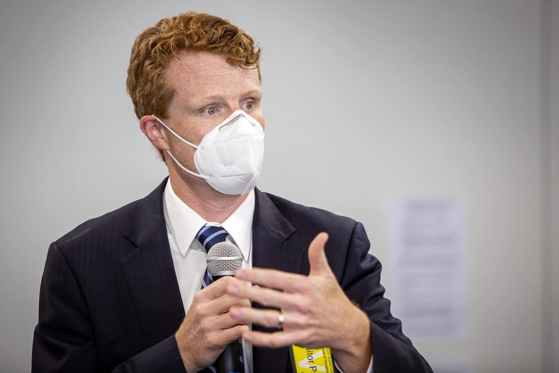 Rep. Joe Kennedy talks with inmates and detainees at the Suffolk County House of Correction. (Robin Lubbock/WBUR)