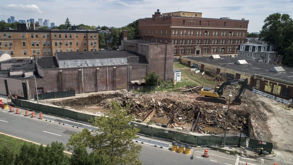 The site on Warren Street where the Roxbury Love mural formerly stood. (Robin Lubbock/WBUR)