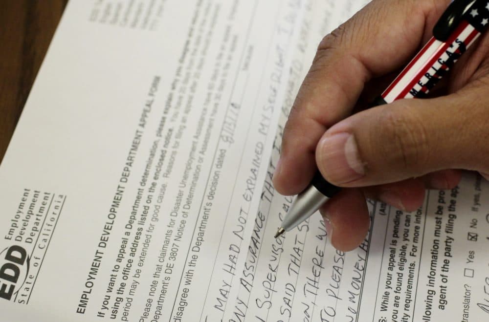 DeiDra Blakley says she has been trying to receive unemployment benefits for months now. (Damian Dovarganes/AP)