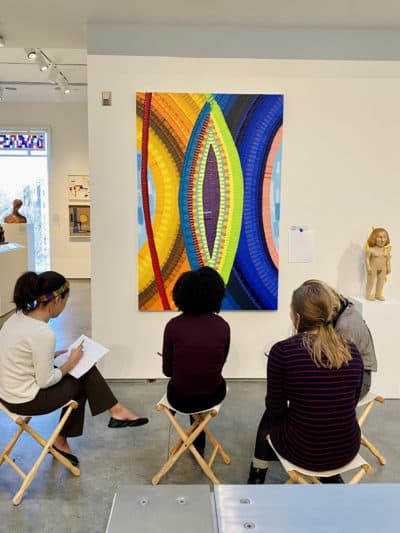 Wellesley College students studying June Edmonds's 2018 painting "A Tisket." (Courtesy Davis Museum at Wellesley College)