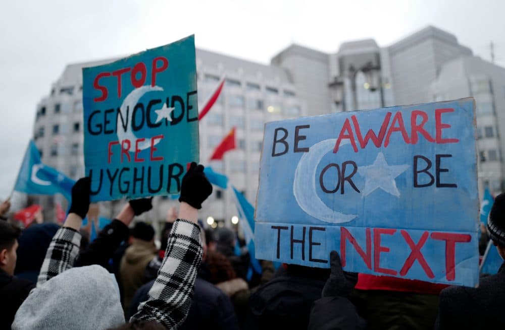 Demonstrators take part in a protest outside the Chinese embassy in Berlin on Dec. 27, 2019, to call attention to Chinas mistreatment of members of the Uyghur community in western China. (John MacDougall/AFP via Getty Images)