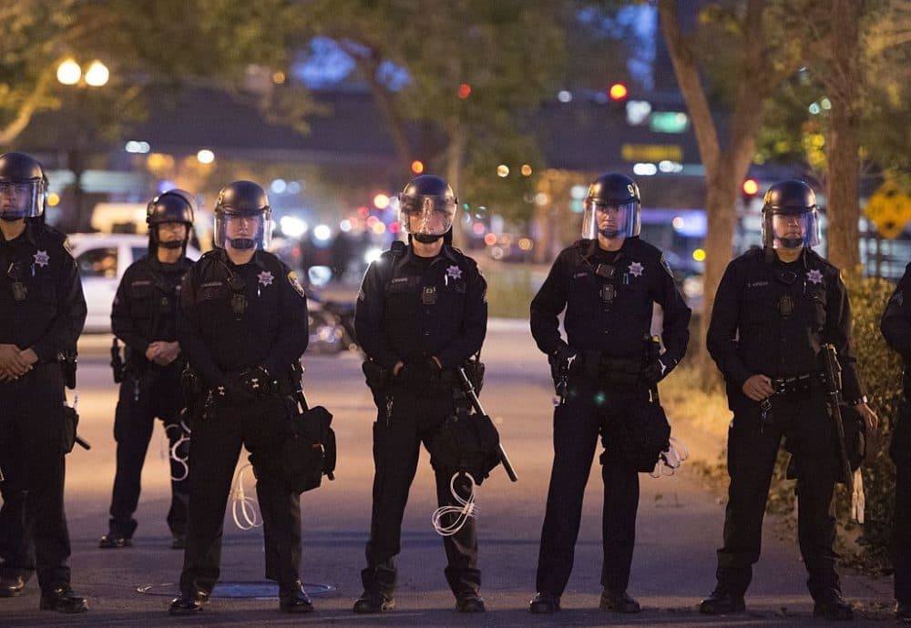 Police form a skirmish line during a May Day protest in Oakland, California on May 1, 2015. (Josh Edelson/AFP/Getty Images)