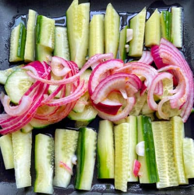 Cucumber and pickled red onion salad with spicy sesame oil. (Kathy Gunst/Here & Now)