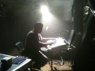 Lighting technician Jose "Flecha" Hernandez working on a film set. (Courtesy)