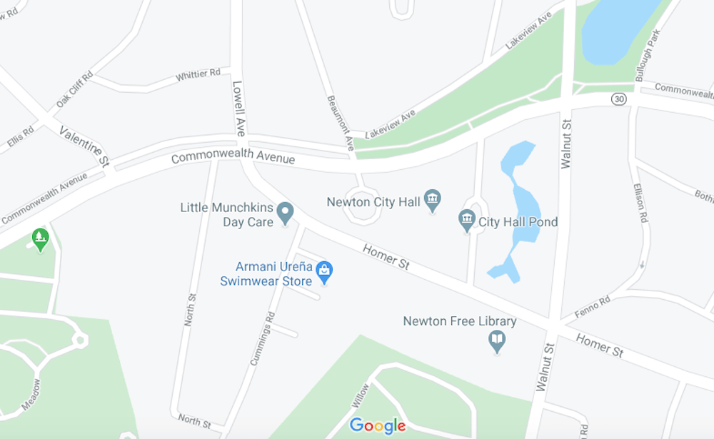 The truck drove through a crowd of demonstrators that had gathered outside Newton City Hall Tuesday. (Google Maps)