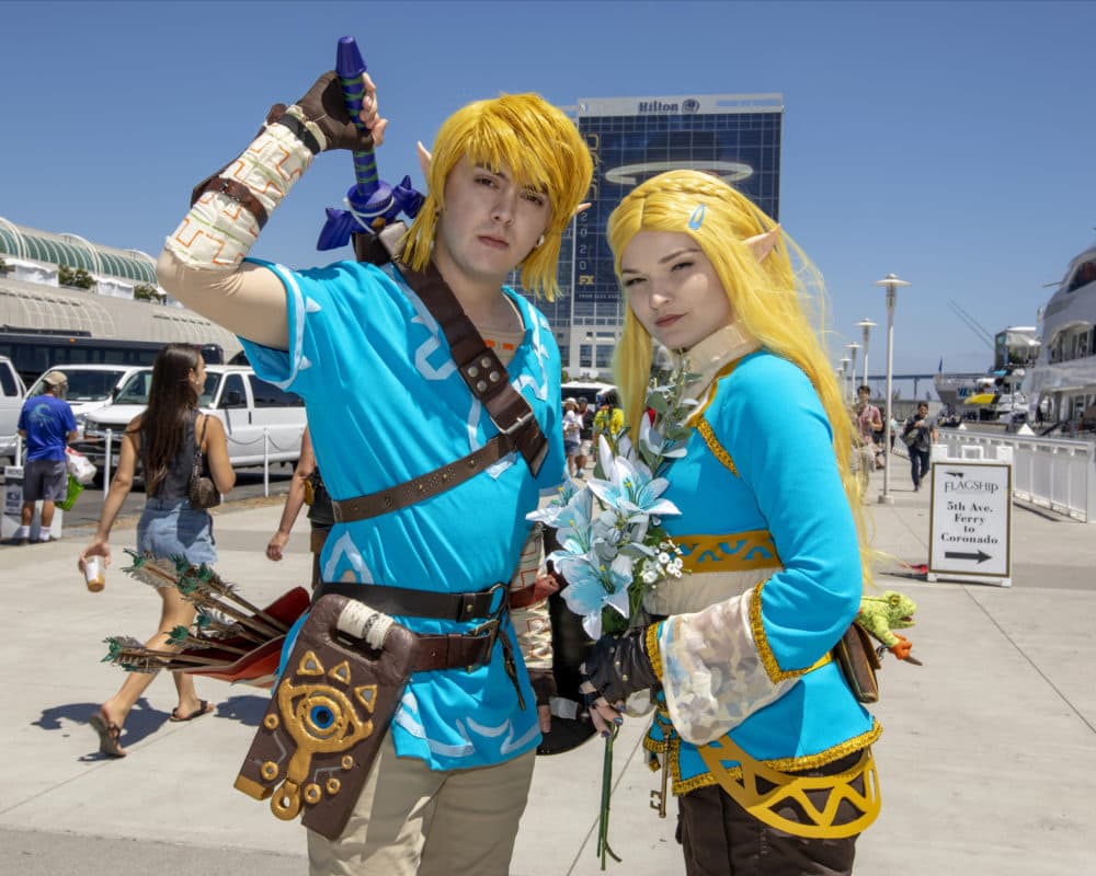 Christian Capuccino, left, dressed as "Link" and Dayna Austin dressed as "Zelda," pose on Day Two at Comic-Con International on Friday, July 19, 2019, in San Diego, Calif. (Photo by Christy Radecic/Invision/AP)