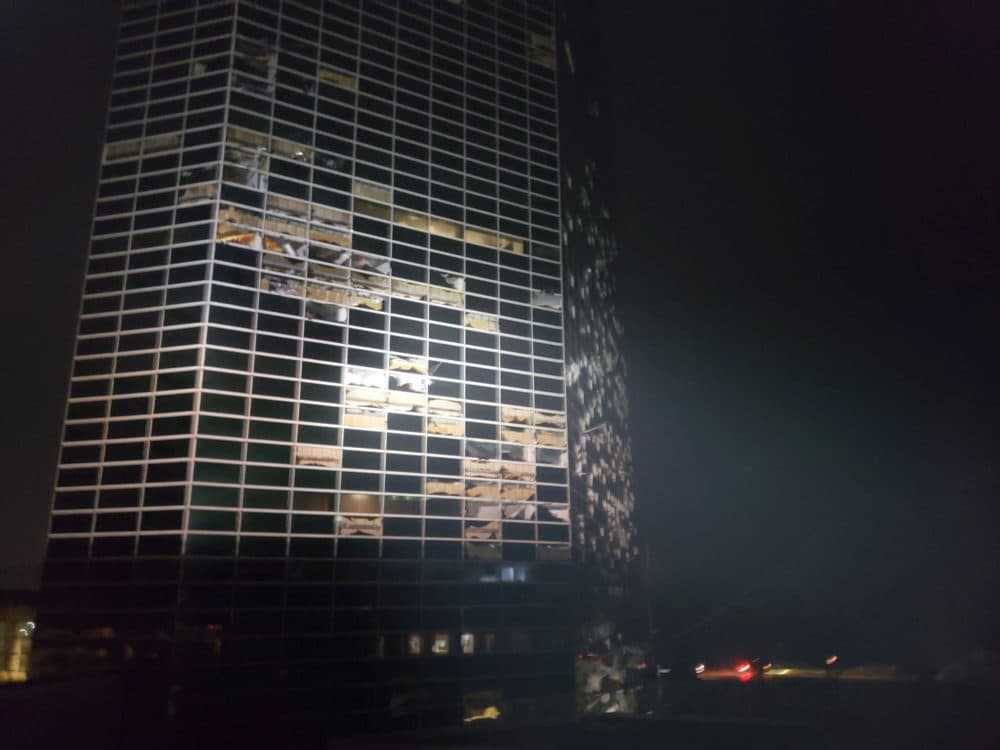 A building that was damaged overnight by Hurricane Laura stands in Lake Charles, La., Thursday, Aug. 27, 2020. (Stephen Jones via AP)