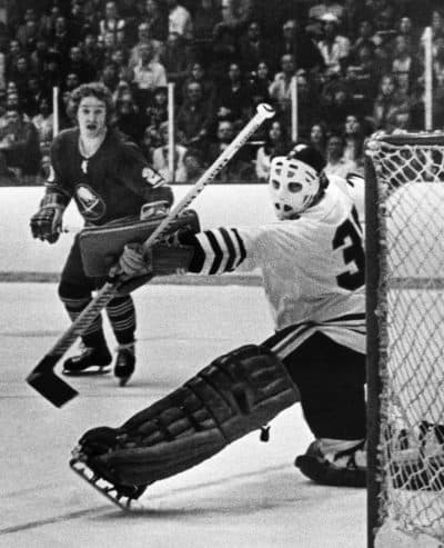 Brian Spencer, by 1974 a Buffalo Sabre, fires a shot past Chicago Blackhawks goalie Tony Esposito. (Larry Stoddard/AP)