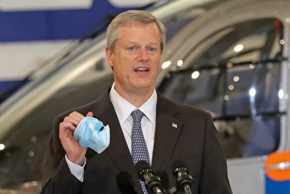 Governor Charlie Baker speaks to the press after he toured Boston MedFlight Headquarters at Hanscom Air Field in Bedford, MA on Aug. 4, 2020 to learn about their ongoing work to transport COVID-19 patients from community hospitals to larger Boston hospitals. (David L. Ryan/The Boston Globe via Getty Images)