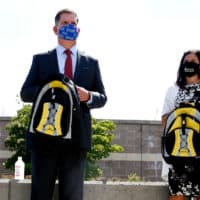 Mayor Marty Walsh and  Superintendent Brenda Cassellius pose for a photograph together at the Salvation Army and TD Garden's Back to School Celebration in Dorchester on Aug. 18, 2020. ( Jessica Rinaldi/The Boston Globe via Getty Images)