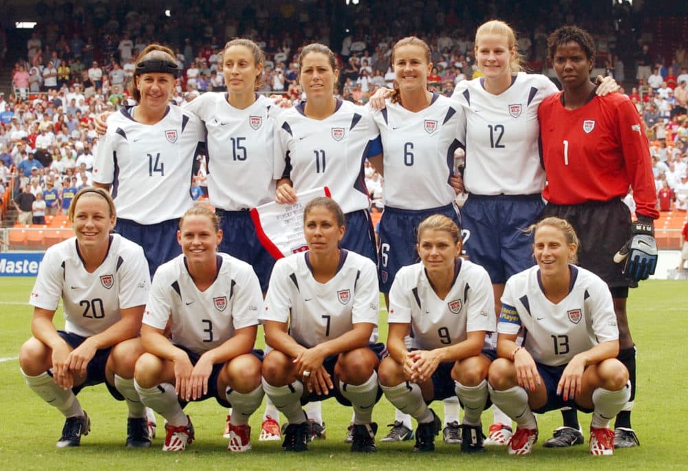 Mia Hamm (9) and Kristine Lilly (13) were teammates on the U.S. women's national since they were teenagers. (Susan Walsh/AP)