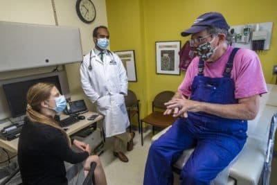Patient Steve Kearns describes his experience after contracting West Nile Virus during a follow up appointment at CHA Somerville Hospital. (Jesse Costa/WBUR)