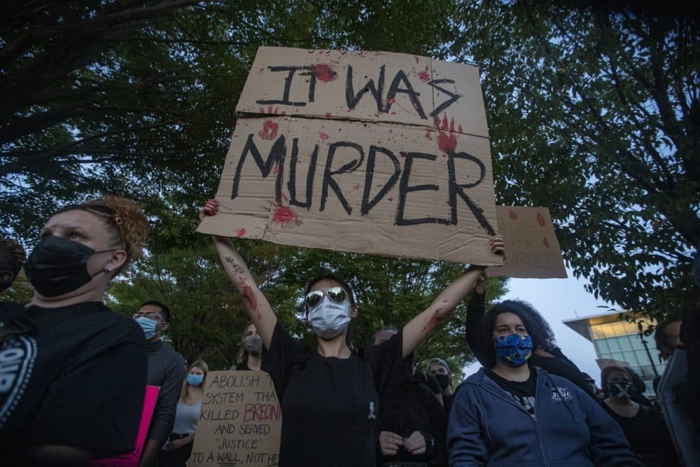 Over a thousand people gathered for a rally on Nubian Square Plaza to protest the decision made by Kentucky Grand Jury in the Breonna Taylor case, Sept. 25, 2020. (Jesse Costa/WBUR)