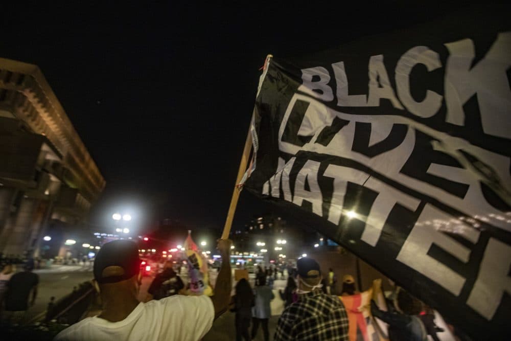 Protesters march down Congress Street in towards City Hall during the Justice for Breonna Taylor rally. (Jesse Costa/WBUR)