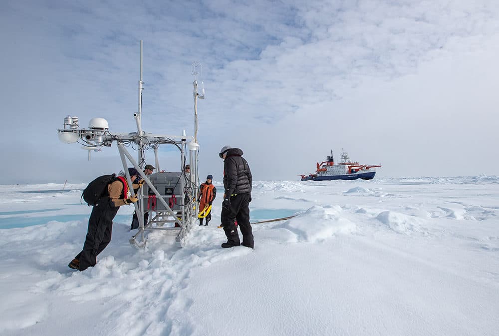 ATMOS and Logistics team finally reach the new destination of the flux sled at the first year ice site. (Alfred-Wegener-Institut/Lianna Nixon)
