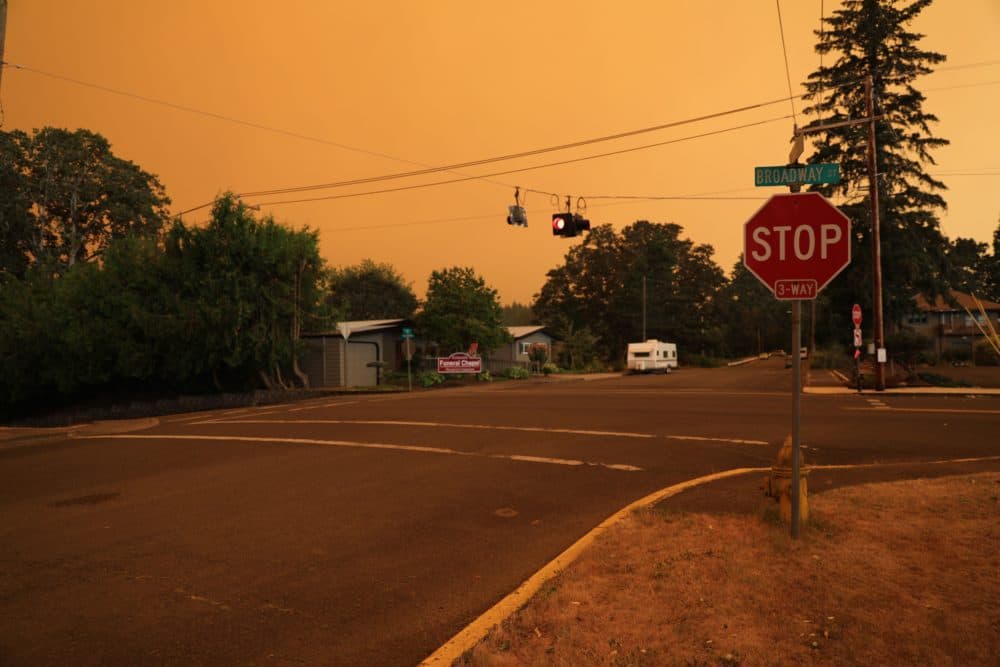 An orange smoke-filled sky is seen above Estacada, Oregon, on September 9, 2020, as fires burn nearby. (Deborah Bloom/AFP via Getty Images)
