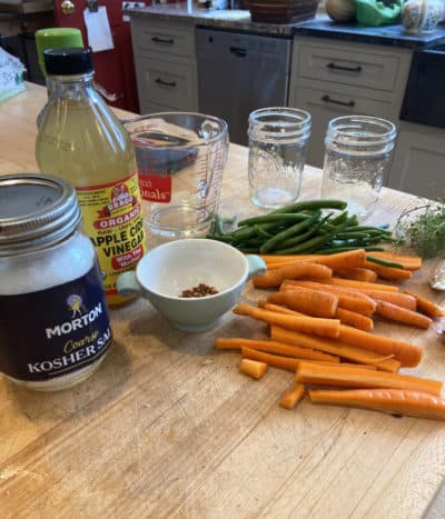 Preparing to can carrots and beans. (Kathy Gunst/Here & Now)