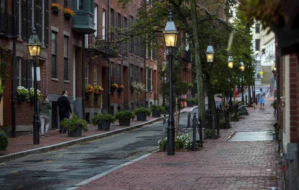 Gas street lamps on Temple Street in the early evening. (Robin Lubbock/WBUR)