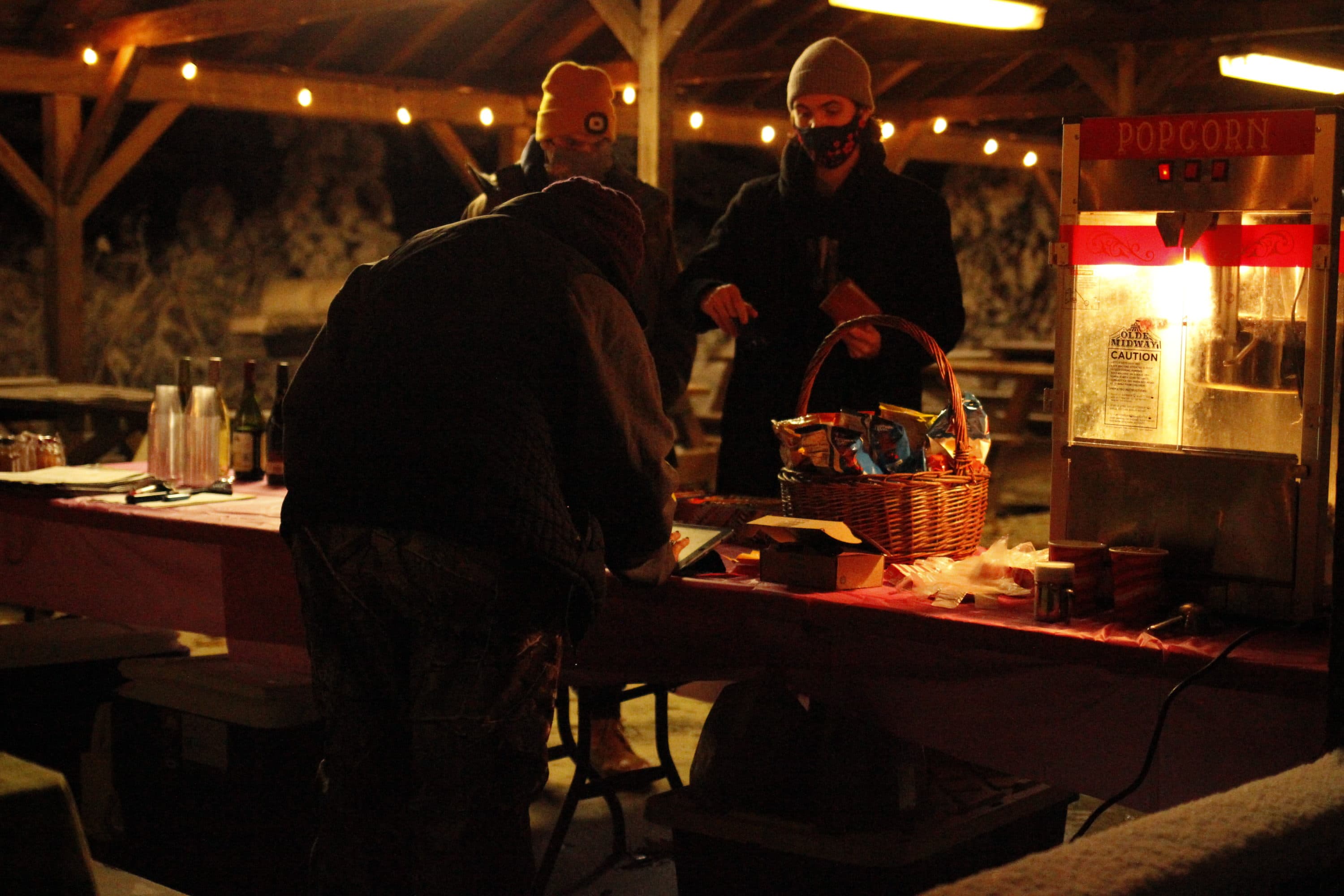 Guests purchase concessions from the Trustees of the Reservation. Warm beverages were a big hit, but a few bare hands were spotted bravely grasping a cold beer. (Jenn Stanley/WBUR)