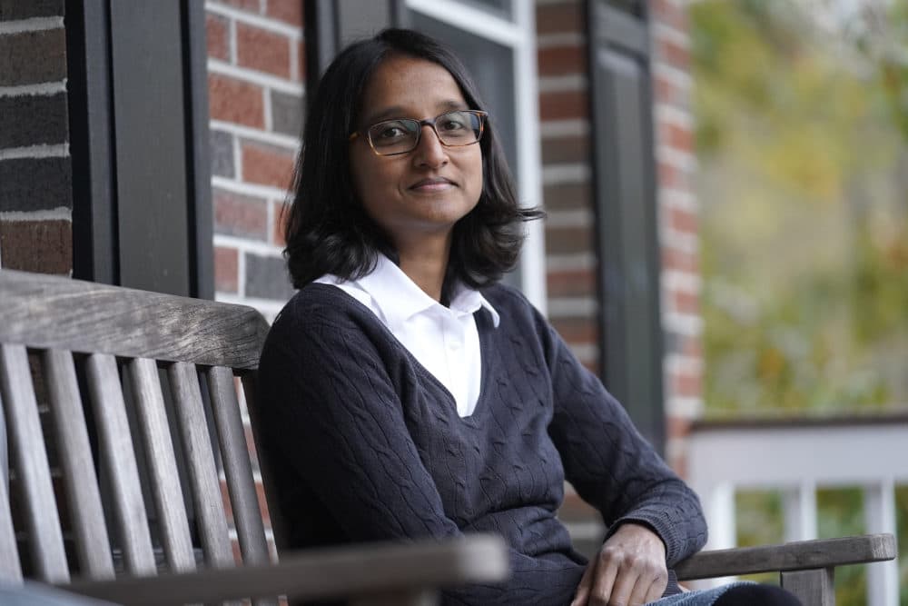 Erika Constantine, of North Attleboro, Mass., poses for a portrait on the front porch of her home, Oct. 29, 2020, in North Attleboro. (Steven Senne/AP)