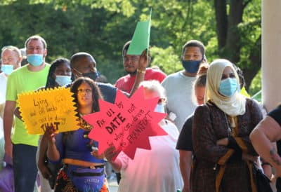 Hundreds of unemployed Kentucky residents wait in long lines outside the Kentucky Career Center for help with their unemployment claims on June 19, 2020 in Frankfort, Kentucky. (John Sommers II/Getty Images)
