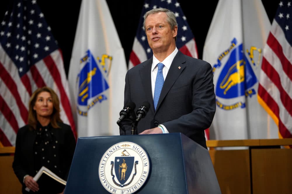 Gov. Baker speaks with Lt. Gov. Karyn Polito at the State House on June 30, 2020. (Barry Chin/The Boston Globe via Getty Images)