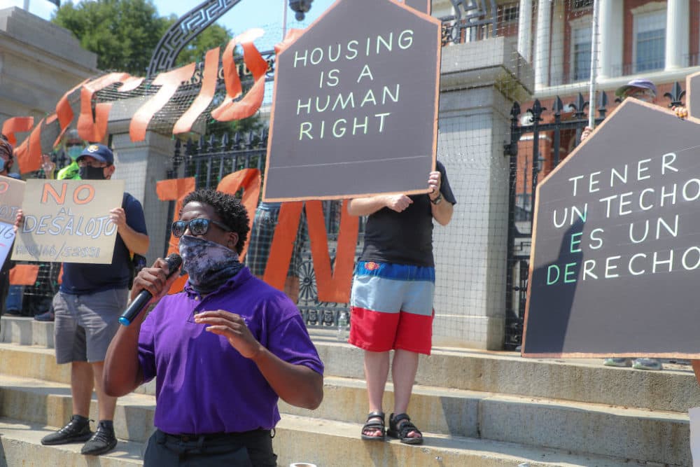 Protesters gather at a rally in support of bills and legislation to block evictions in Massachusetts for up to a year in front of the Massachusetts State House in Boston on July 22, 2020. (Matthew J. Lee/The Boston Globe via Getty Images)