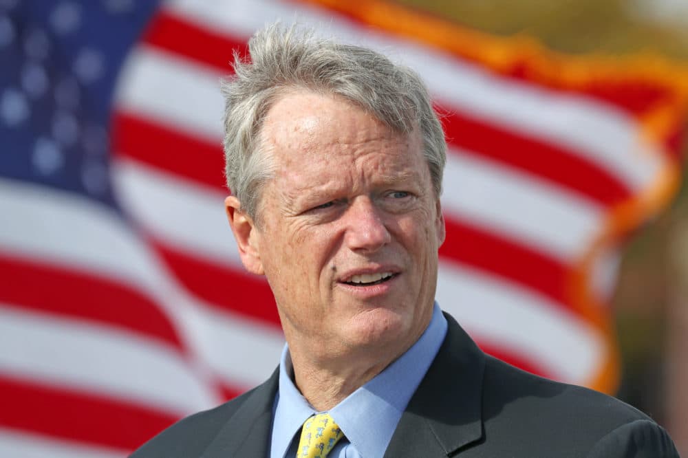 Gov. Charlie Baker speaks at the podium during a press conference on a visit to Suffolk Downs Drive-Through Testing Site in Revere, MA during the COVID-19 pandemic on Oct. 20, 2020. (Photo by David L. Ryan/The Boston Globe via Getty Images)