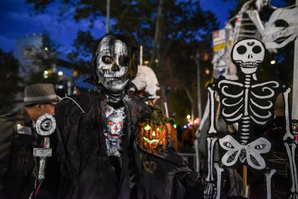 People in costumes participate in the annual Village Halloween parade on Sixth Avenue on Oct. 31, 2018 in New York City. (Stephanie Keith/Getty Images)