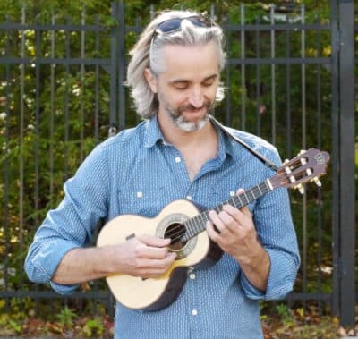 Circle Round guest musician Jason Ennis playing the cavaquinho. (Courtesy Eric Shimelonis)