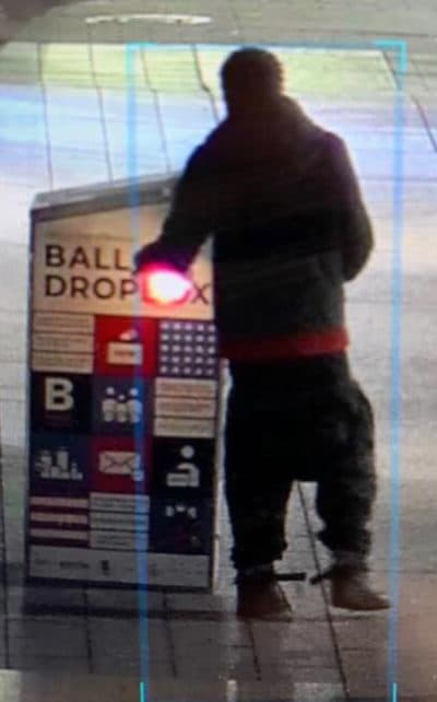 A surveillance image, released by Boston police, of a person they are seeking to identify as part of the ongoing investigation into the ballot box fire. (Courtesy Boston Police Department)