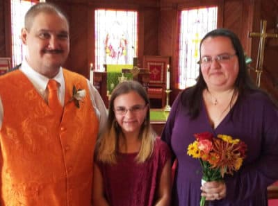 Robert and Summer Barrios with their daughter Jessica during the couple's vow renewal on their 10th anniversary on Oct. 16, exactly a month after Robert left the hospital. Just a preacher and their daughter were present, and Summer says Robert took his oxygen off just long enough for the photo. (Courtesy)