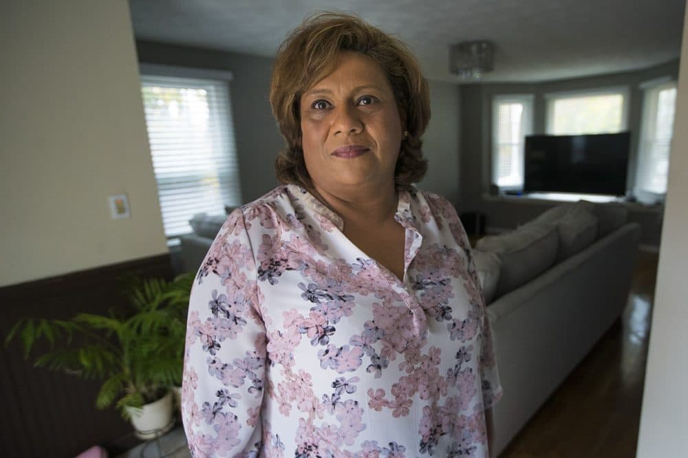 Irma Flores in her home in Haverhill in 2017. (Jesse Costa/WBUR)
