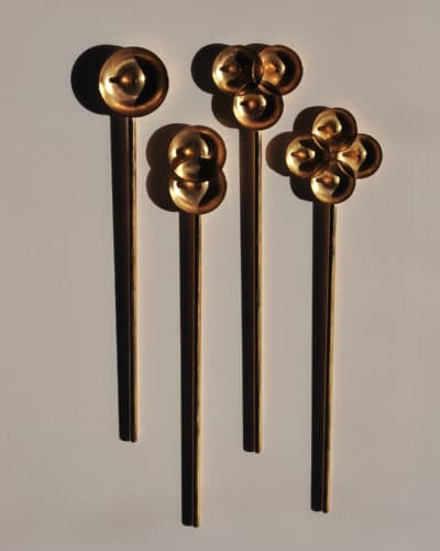 Suna Bonometti's four brass "donut spoons." (Courtesy of the artist and Fuller Craft Museum)