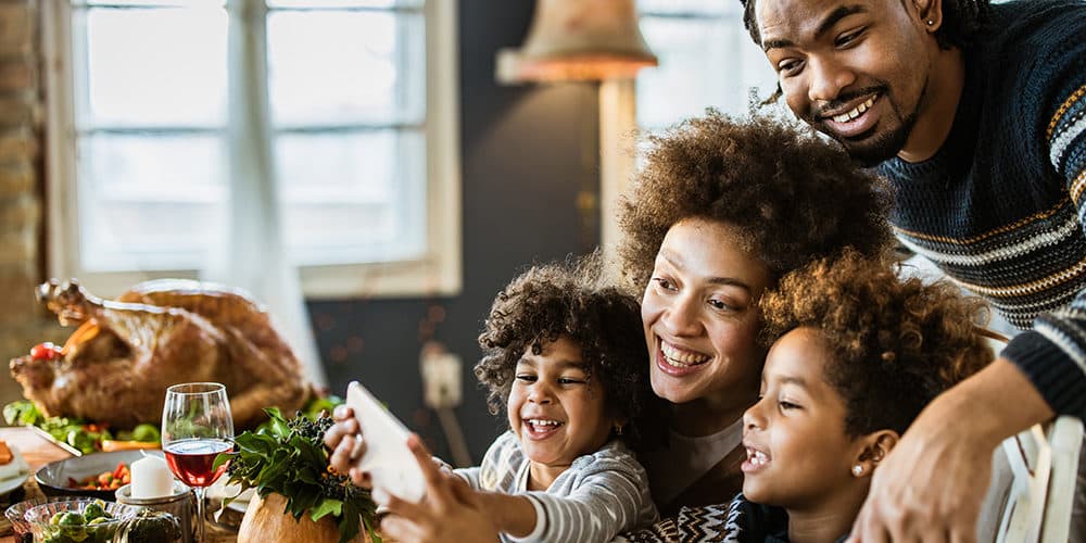 Keep your Thanksgiving gatherings to your household only this year, says Dr. Asaf Bitton, public health expert and physician at Brigham and Women's Hospital. (Getty Images)