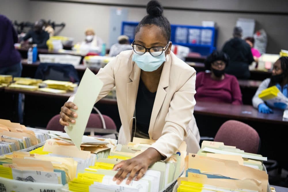 Election workers sort ballots at the Dekalb County Voter Registration and Elections Office in Decatur, Ga., on Monday, November 2, 2020. (Tom Williams/CQ Roll Call)