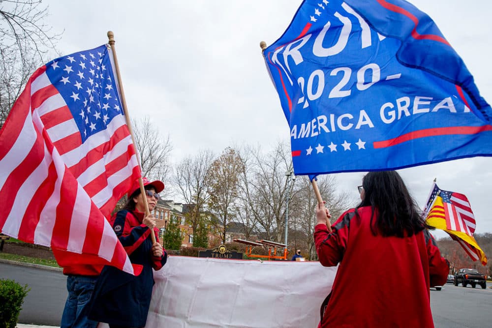 Supporters of US President Donald Trump wait to see him to leave Trump National Golf Club on November 22, 2020 in Sterling, Virginia. (Tasos Katopodis/Getty Images)