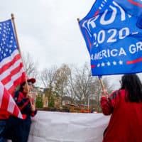 Supporters of US President Donald Trump wait to see him to leave Trump National Golf Club on November 22, 2020 in Sterling, Virginia. (Tasos Katopodis/Getty Images)