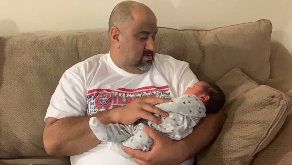Ahmed Al-Zubaidi of Beaverton, Oregon holds his infant son, born on Nov. 3 (Photo provided by Ahmed Al-Zubaidi)