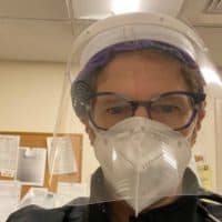 Dr. Pamela Adelstein wearing a mask and face shield. (Courtesy)