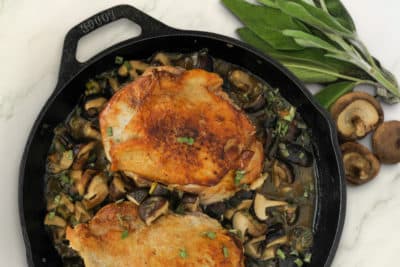 Turkey thighs in a skillet. (Cynthia Graubart)