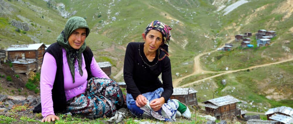 In a still from Fatih Ertekin's "Transhumant,” two women are seen taking a rare break to talk about their nomadic culture caring for livestock high in the Georgian mountains. (Courtesy Boston Turkish Festival)