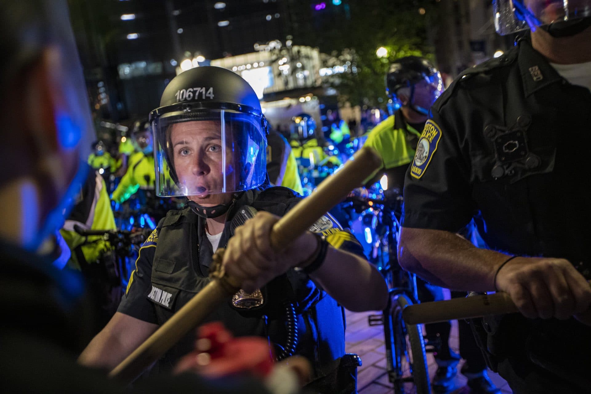 A line of Boston Police officers forced protesters out of Downtown Crossing after the Black Lives Matter rally at the Massachusetts State House on May 31, 2020. (Jesse Costa/WBUR)