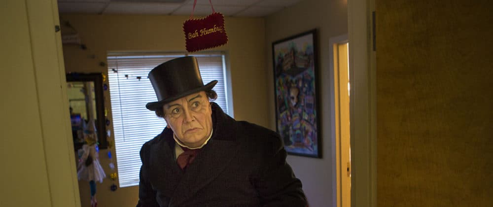 Coffee leaves the dressing room en route to the stage for a performance. (Jesse Costa/WBUR)