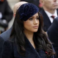 In this Thursday, Nov. 7, 2019 file photo Meghan the Duchess of Sussex stands after she and her husband Britain's Prince Harry placed a Cross of Remembrance as they attend the official opening of the annual Field of Remembrance at Westminster Abbey in London. The Duchess of Sussex has revealed that she had a miscarriage in July. Meghan described the experience in an opinion piece in the New York Times on Wednesday. She wrote: "I knew, as I clutched my firstborn child, that I was losing my second." The former Meghan Markle and husband Prince Harry have a son, Archie, born in 2019. (Matt Dunham/AP)