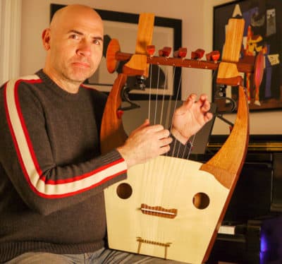 Composer Eric Shimelonis playing the kithara. (courtesy of Rebecca Sheir)